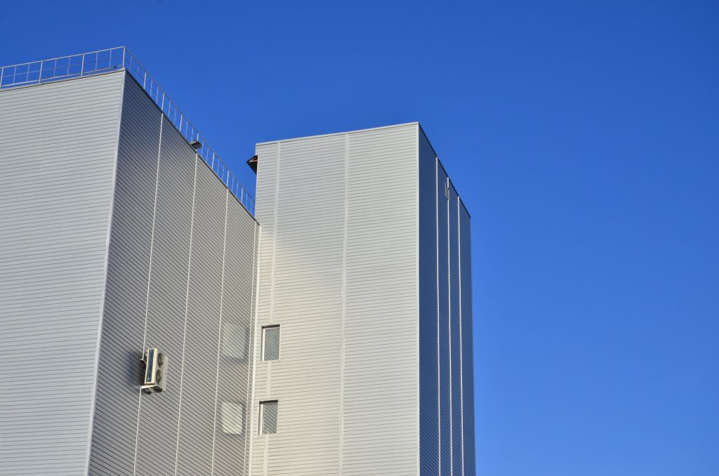 Siding on industrial high-rise building